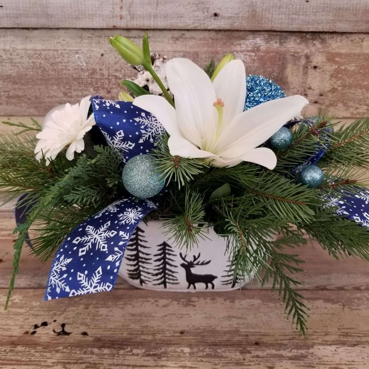 Floral Arrangement in a Christmas ceramic container